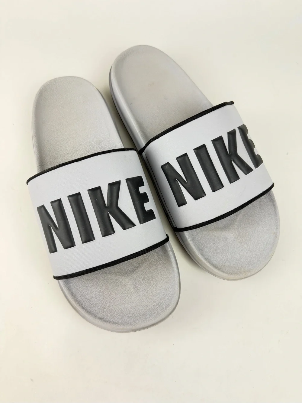 Nike Offcourt Slides in Gray with Black Logo